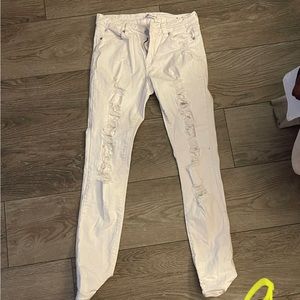 White holy jeans